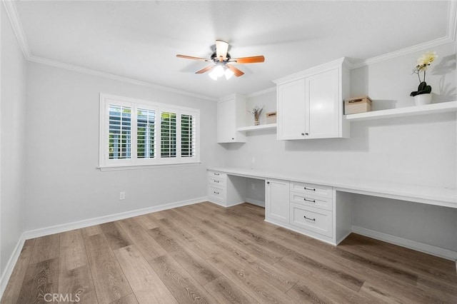 2244 N 1st Ave, Upland, CA 91784 - unfurnished office featuring built in study area, ceiling fan, light wood-type flooring, and crown molding