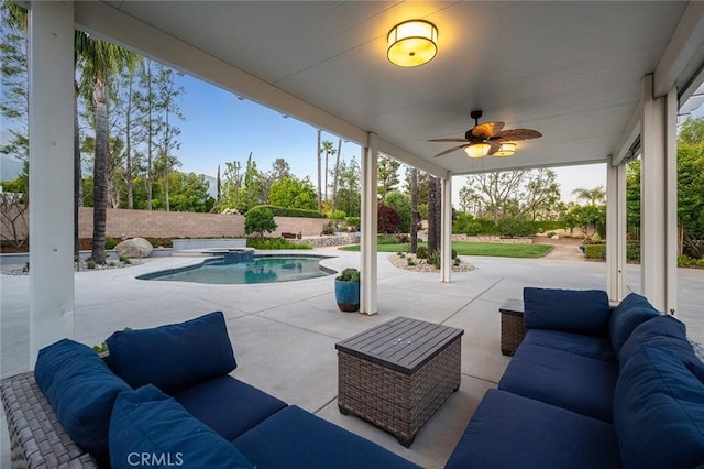 2244 N 1st Ave, Upland, CA 91784 - fenced backyard with an outdoor hangout area, a patio, a ceiling fan, and a pool with connected hot tub