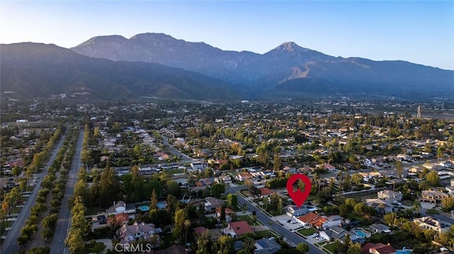 2244 N 1st Ave, Upland, CA 91784 - aerial view of property's location with a mountain backdrop and nearby suburban area