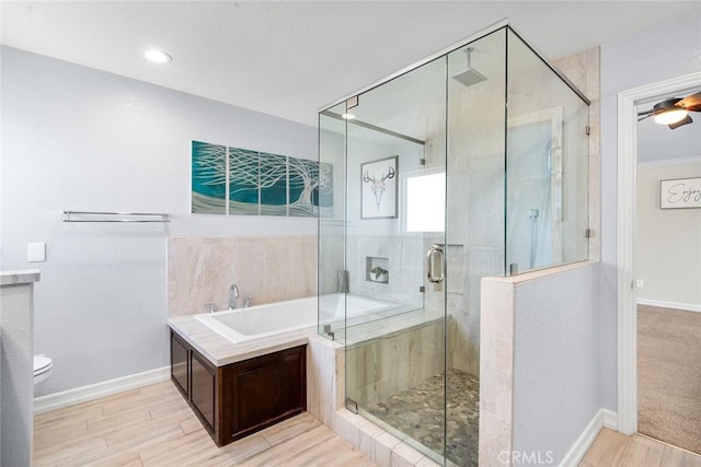 2244 N 1st Ave, Upland, CA 91784 - full bath featuring a garden tub, a shower stall, and wood finished floors
