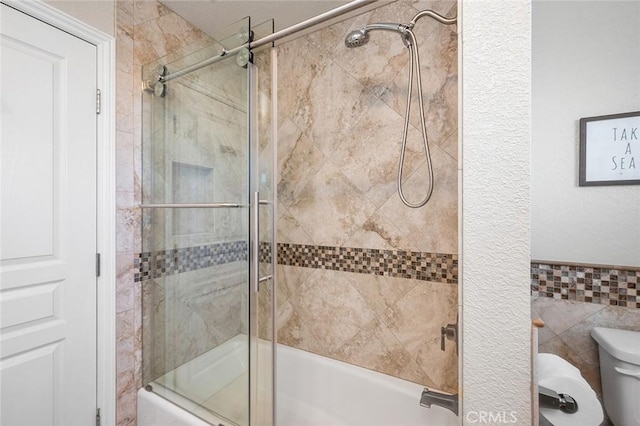 2244 N 1st Ave, Upland, CA 91784 - bathroom with bath / shower combo with glass door and tile walls