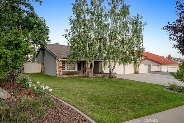 2244 N 1st Ave, Upland, CA 91784 - ranch-style house featuring concrete driveway, stucco siding, an attached garage, and a tile roof