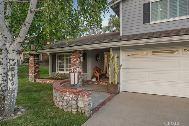 2244 N 1st Ave, Upland, CA 91784 - view of front of property with a front yard, driveway, and stucco siding