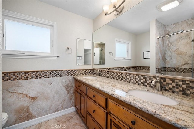 2244 N 1st Ave, Upland, CA 91784 - full bath with a stall shower, double vanity, tile patterned flooring, and tile walls