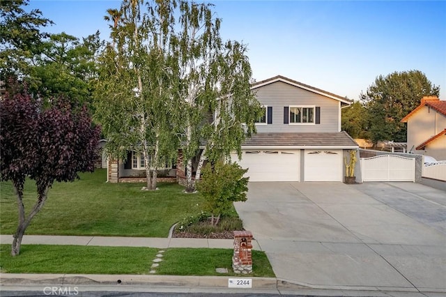 2244 N 1st Ave, Upland, CA 91784 - view of front of house featuring driveway and an attached garage