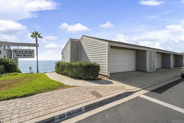 1744 Tattenham Rd, Encinitas, CA 92024 - garage with a water view and driveway