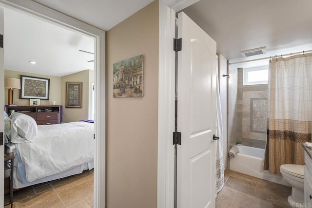 1744 Tattenham Rd, Encinitas, CA 92024 - bathroom with shower / bath combo, toilet, stone tile floors, ensuite bath, and recessed lighting