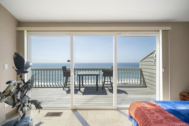 1744 Tattenham Rd, Encinitas, CA 92024 - bedroom featuring access to outside, a water view, and stone tile floors