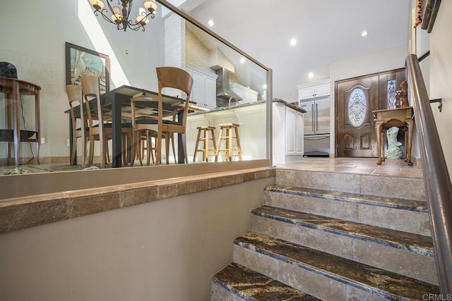 1744 Tattenham Rd, Encinitas, CA 92024 - stairs featuring a chandelier and recessed lighting