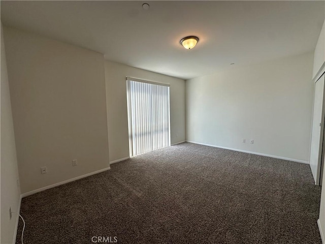 7551 Jordan Ave Unit 410, Canoga Park, CA 91303 - empty room featuring carpet floors and baseboards
