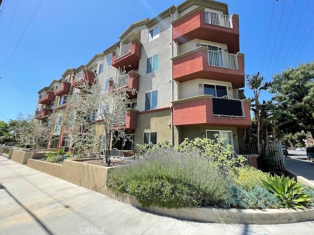 7551 Jordan Ave Unit 410, Canoga Park, CA 91303 - view of apartment building / complex