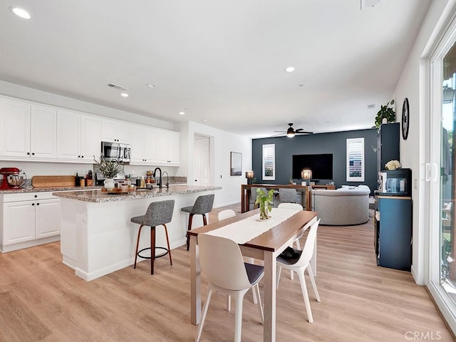 8967 Sunshine Valley Way, Corona, CA 92883 - dining space with plenty of natural light, a ceiling fan, light wood-type flooring, and recessed lighting