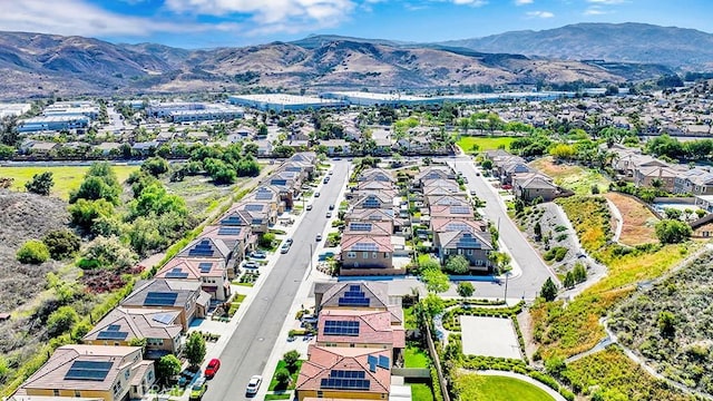 8967 Sunshine Valley Way, Corona, CA 92883 - aerial view of residential area with a mountainous background