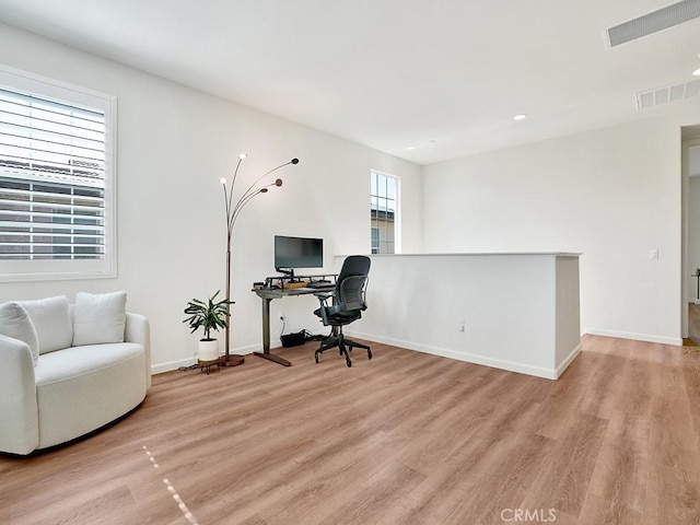 8967 Sunshine Valley Way, Corona, CA 92883 - home office featuring light wood-style flooring, recessed lighting, and baseboards