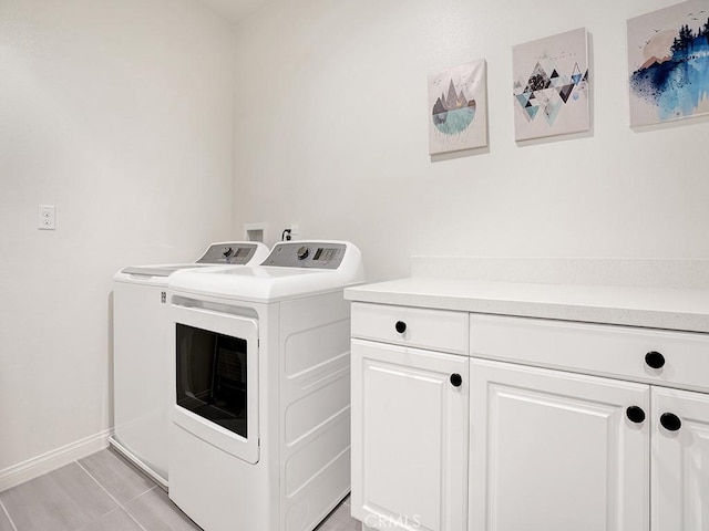 8967 Sunshine Valley Way, Corona, CA 92883 - washroom featuring washing machine and dryer, cabinet space, and baseboards