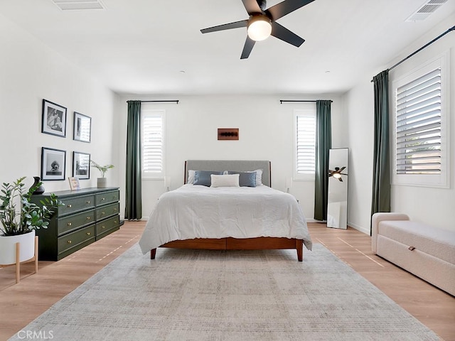 8967 Sunshine Valley Way, Corona, CA 92883 - bedroom featuring light wood-style floors and a ceiling fan