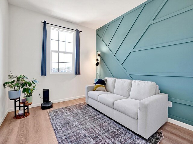 8967 Sunshine Valley Way, Corona, CA 92883 - living room with wood finished floors and baseboards