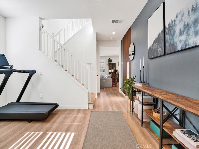 8967 Sunshine Valley Way, Corona, CA 92883 - entryway featuring light wood-type flooring, stairway, recessed lighting, and baseboards