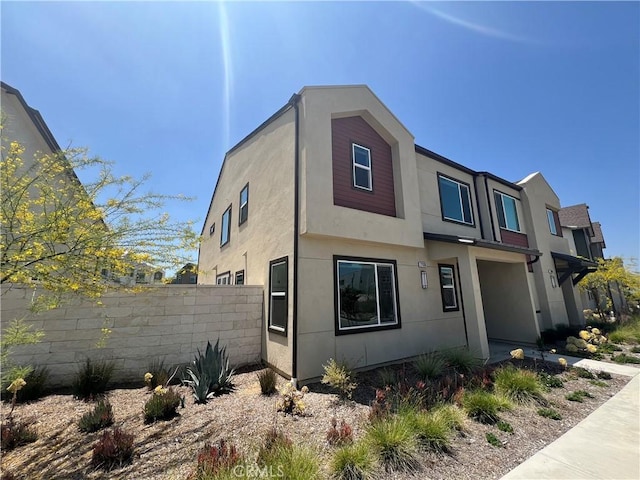 27636 Symphony Pl, Valencia, CA 91381 - view of front of home featuring stucco siding