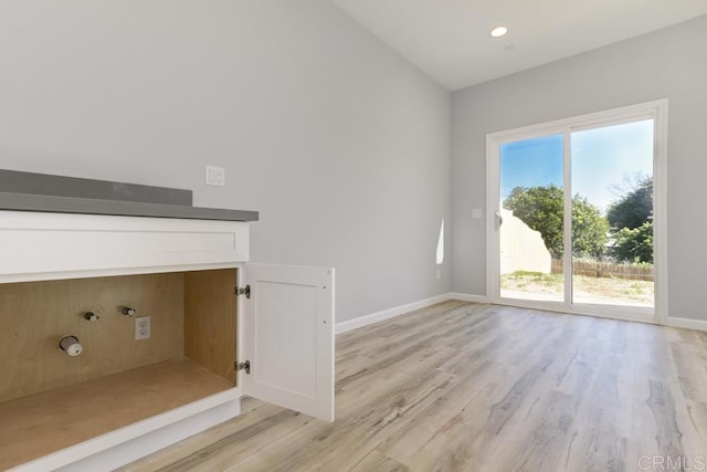 535 60th St, San Diego, CA 92114 - unfurnished living room with light wood-style floors, baseboards, lofted ceiling, and recessed lighting
