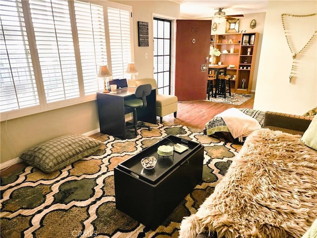 2772 E 2nd St Unit E2, Long Beach, CA 90803 - living room with wood finished floors, plenty of natural light, ceiling fan, baseboards, and ornamental molding