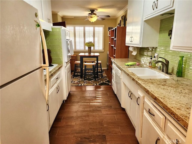 2772 E 2nd St Unit E2, Long Beach, CA 90803 - kitchen with white appliances, ornamental molding, a sink, ceiling fan, and dark wood-type flooring