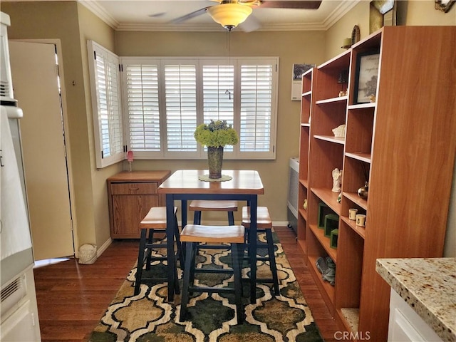 2772 E 2nd St Unit E2, Long Beach, CA 90803 - dining area with a ceiling fan, dark wood-type flooring, crown molding, and baseboards