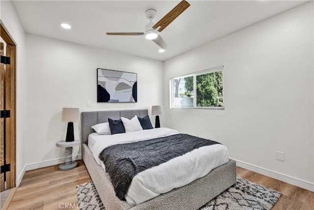 921 Dahlia Ave, Costa Mesa, CA 92626 - bedroom with light wood finished floors, baseboards, recessed lighting, and ceiling fan