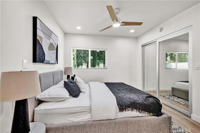 921 Dahlia Ave, Costa Mesa, CA 92626 - bedroom with light wood-style floors, a ceiling fan, recessed lighting, and a closet