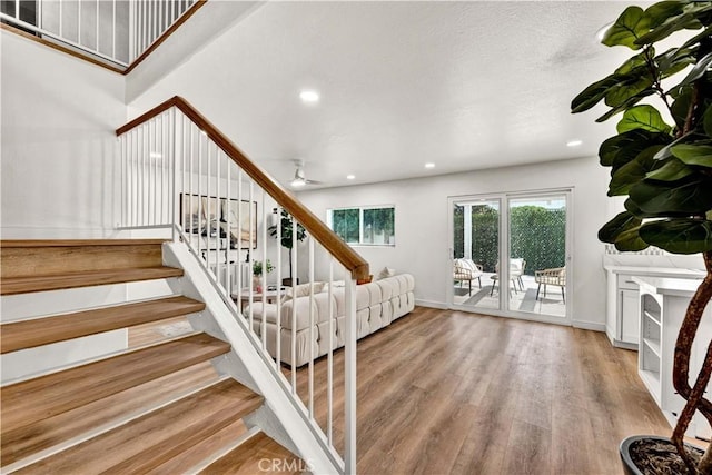 921 Dahlia Ave, Costa Mesa, CA 92626 - stairs with wood finished floors, a ceiling fan, recessed lighting, and baseboards