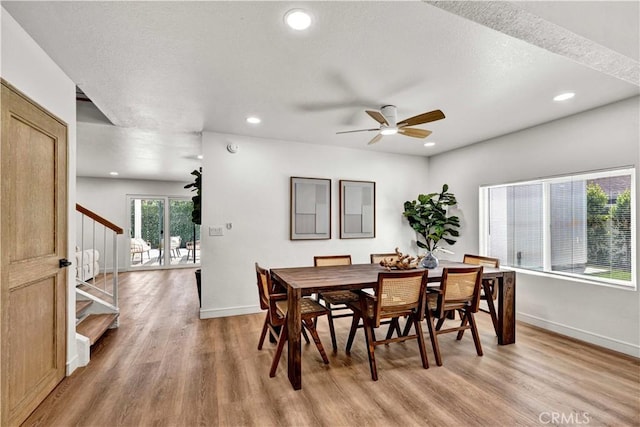 921 Dahlia Ave, Costa Mesa, CA 92626 - dining space featuring stairway, light wood finished floors, a ceiling fan, baseboards, and recessed lighting