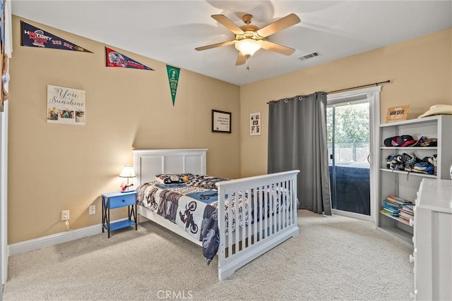 14690 Paynes Creek Rd, Red Bluff, CA 96080 - bedroom with carpet, baseboards, and ceiling fan