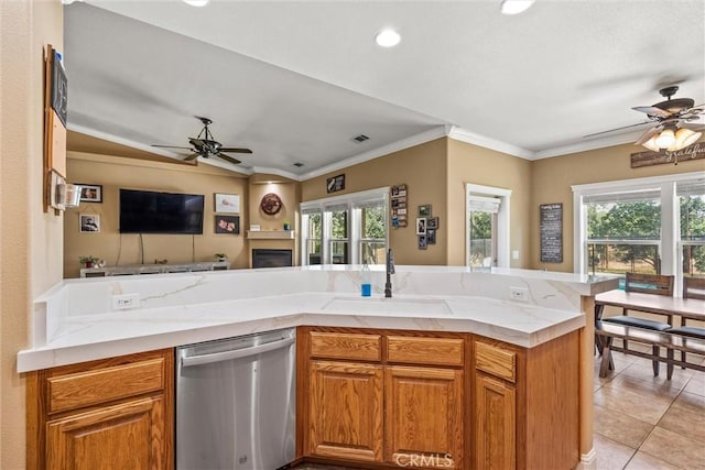 14690 Paynes Creek Rd, Red Bluff, CA 96080 - kitchen with dishwasher, a sink, a ceiling fan, ornamental molding, and plenty of natural light
