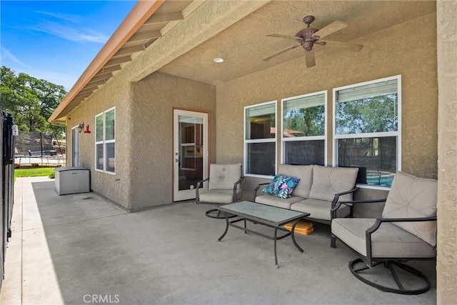 14690 Paynes Creek Rd, Red Bluff, CA 96080 - view of patio / terrace with a ceiling fan and an outdoor hangout area