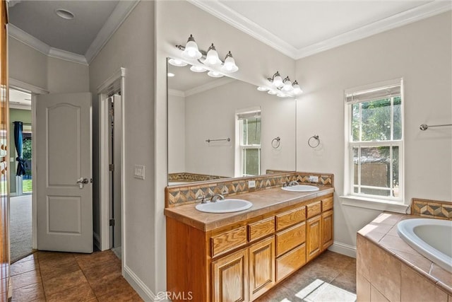 14690 Paynes Creek Rd, Red Bluff, CA 96080 - bathroom featuring tile patterned floors, a garden tub, double vanity, crown molding, and baseboards