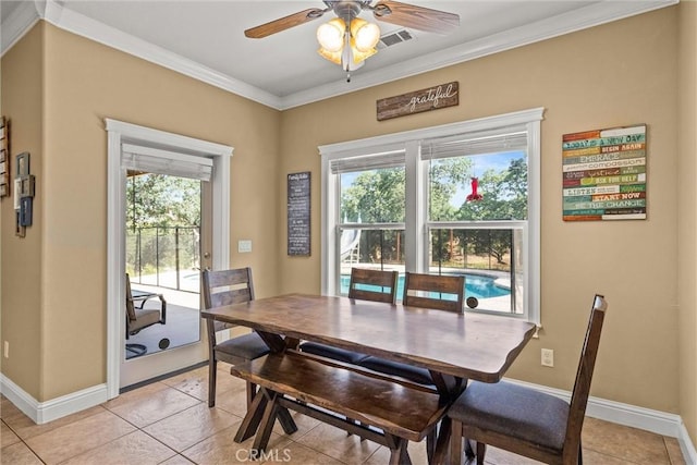 14690 Paynes Creek Rd, Red Bluff, CA 96080 - dining area featuring ceiling fan, crown molding, light tile patterned floors, and baseboards