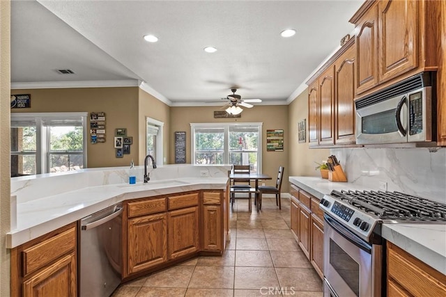 14690 Paynes Creek Rd, Red Bluff, CA 96080 - kitchen with appliances with stainless steel finishes, a sink, healthy amount of natural light, light countertops, and recessed lighting