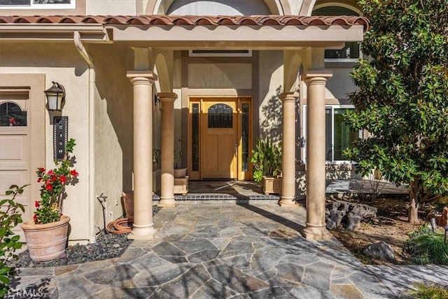 5420 Kodiak Mountain Dr, Yorba Linda, CA 92887 - property entrance with stucco siding and a tiled roof