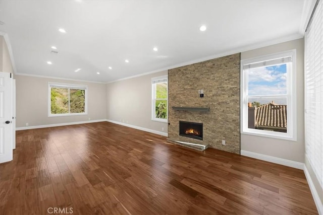 5420 Kodiak Mountain Dr, Yorba Linda, CA 92887 - unfurnished living room featuring ornamental molding, plenty of natural light, wood finished floors, a fireplace, and baseboards