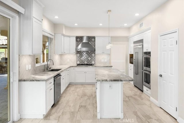 5420 Kodiak Mountain Dr, Yorba Linda, CA 92887 - kitchen featuring wall chimney exhaust hood, a sink, appliances with stainless steel finishes, white cabinetry, and a center island