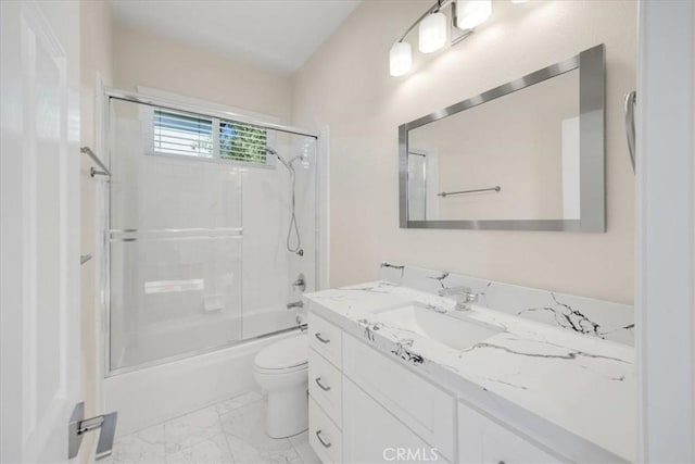 5420 Kodiak Mountain Dr, Yorba Linda, CA 92887 - bathroom featuring vanity, marble look tiles, toilet, and enclosed tub / shower combo