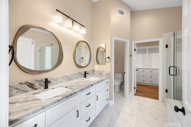 5420 Kodiak Mountain Dr, Yorba Linda, CA 92887 - full bathroom featuring double vanity, a stall shower, and marble look tile flooring