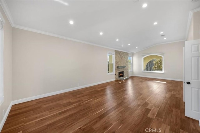 5420 Kodiak Mountain Dr, Yorba Linda, CA 92887 - unfurnished living room with crown molding, lofted ceiling, wood finished floors, a fireplace, and recessed lighting
