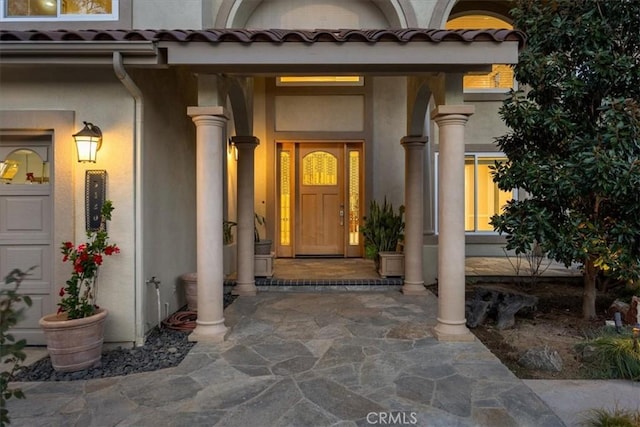 5420 Kodiak Mountain Dr, Yorba Linda, CA 92887 - view of exterior entry with stucco siding and a porch