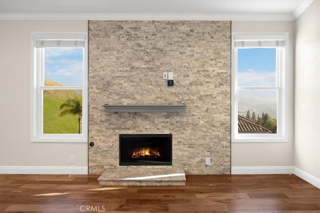 5420 Kodiak Mountain Dr, Yorba Linda, CA 92887 - unfurnished living room featuring wood finished floors, crown molding, and a fireplace