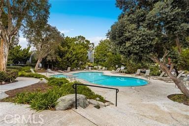 20122 Bayfront Ln Unit 102, Huntington Beach, CA 92646 - swimming pool featuring a patio