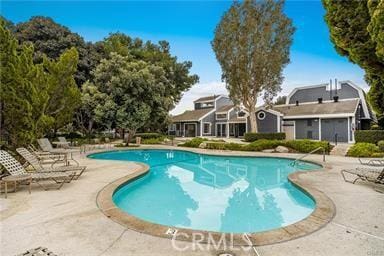 20122 Bayfront Ln Unit 102, Huntington Beach, CA 92646 - outdoor pool featuring a patio