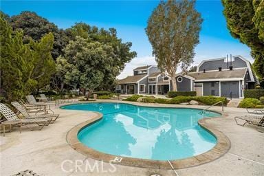 20122 Bayfront Ln Unit 102, Huntington Beach, CA 92646 - swimming pool with a patio