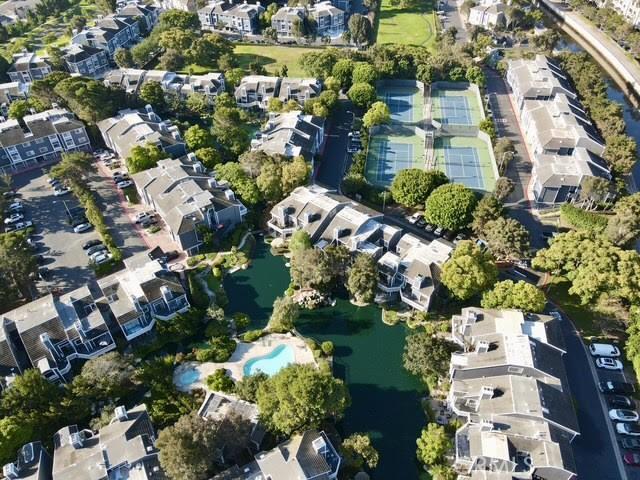 20122 Bayfront Ln Unit 102, Huntington Beach, CA 92646 - aerial overview of property's location with a nearby body of water and nearby suburban area