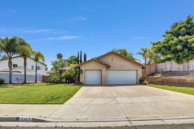 3367 Monique Ln, Spring Valley, CA 91977 - view of front of property with a garage, stucco siding, driveway, and a tile roof